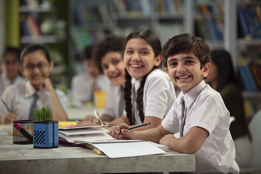 Students in the library during early-years learning